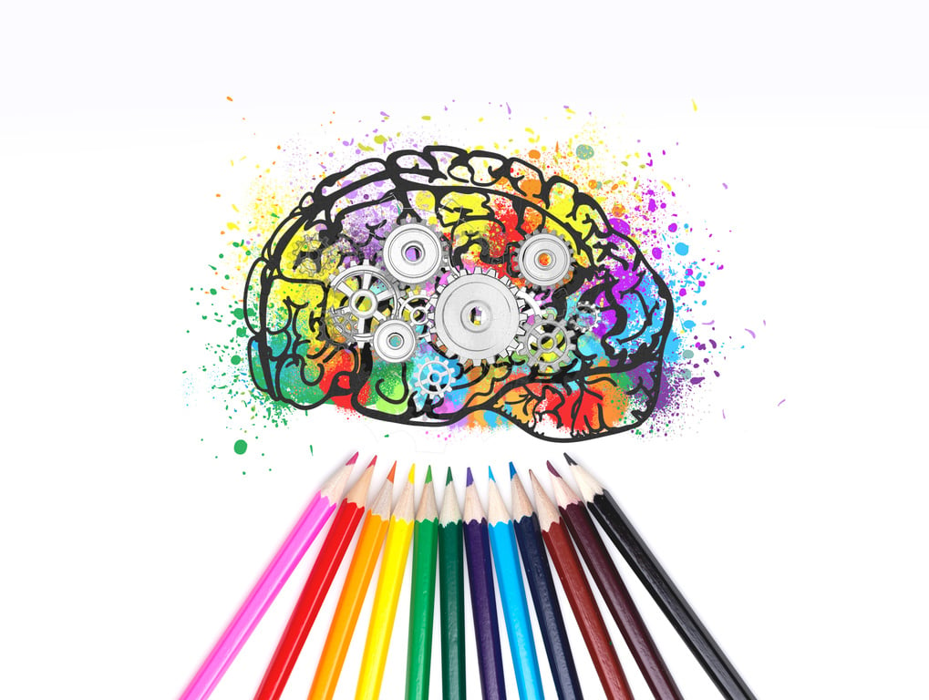 Colorful brain with gears, pencils